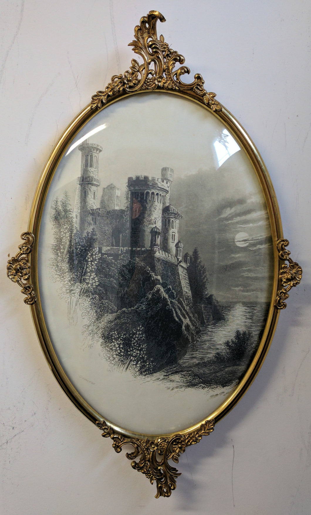 5129  Gold Oval Framed Picture of a Castle on the Sea